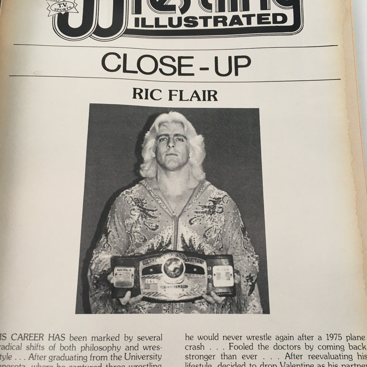Close-up image of Ric Flair featured in Pro Wrestling Illustrated Magazine May 1982, showcasing his wrestling career and championship belt.