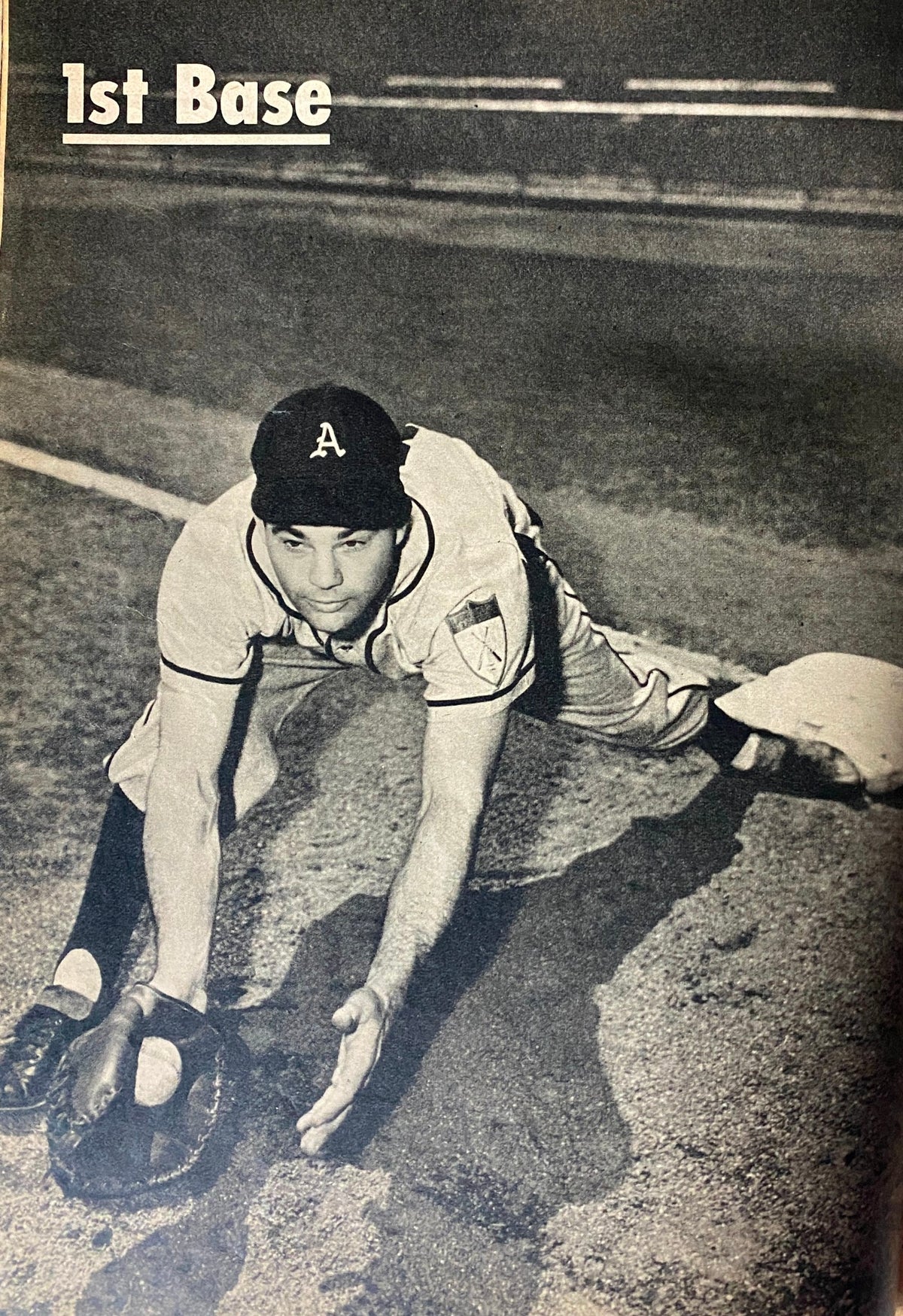 Action shot from 'Baseball's Best' 1952 Edition featuring Ferris Fain making a play at first base.