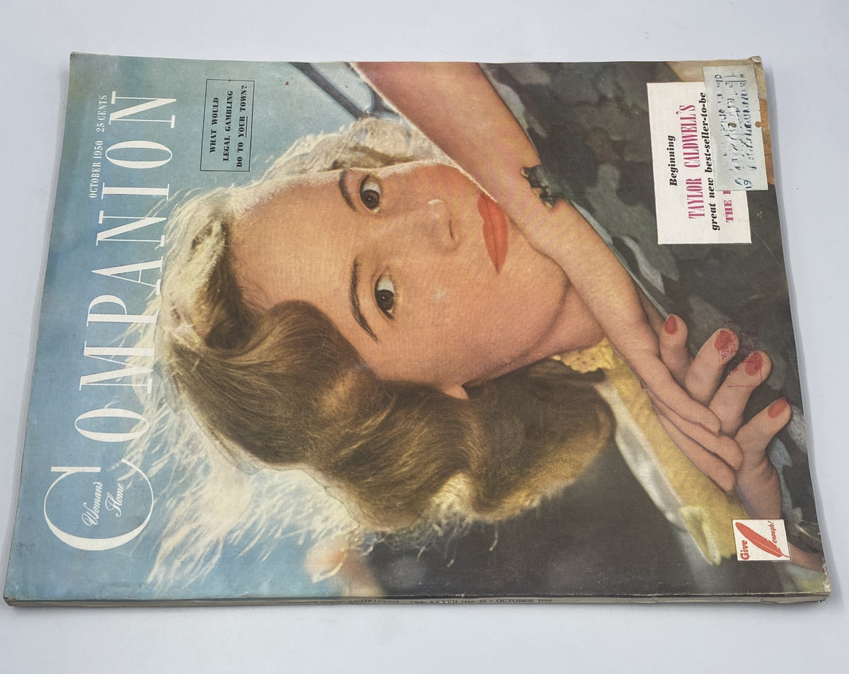 Another view of Woman’s Home Companion Magazine October 1950 showcasing the cover image of a young woman with stylish hair and glamorous makeup. The magazine features content by Taylor Caldwell and aims to engage readers with contemporary issues.