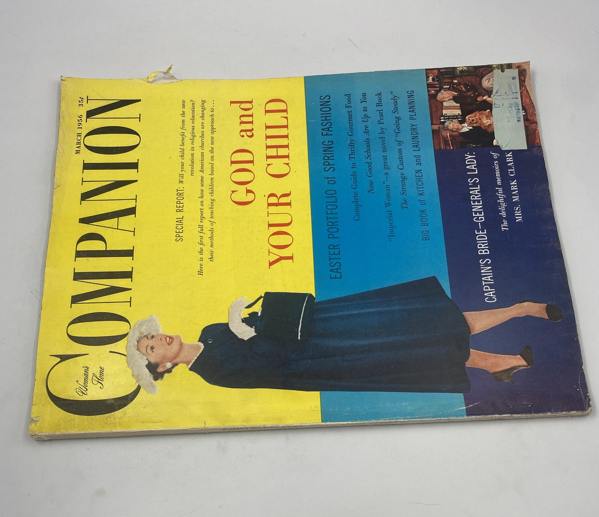 Cover of Woman’s Home Companion Magazine March 1956 featuring the title 'God and Your Child' and an elegant woman in a stylish outfit.