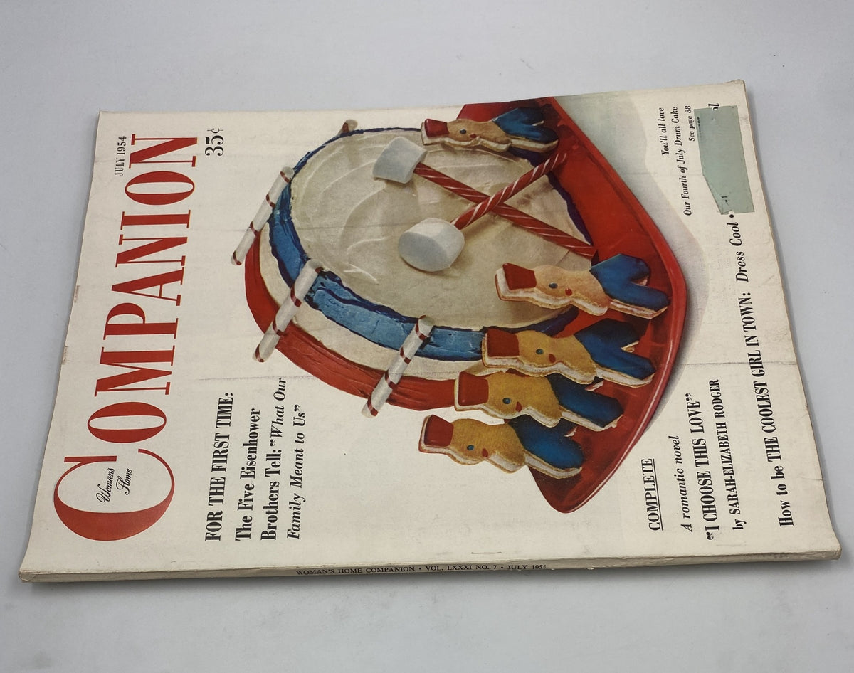 Another view of the Woman’s Home Companion Magazine July 1954 cover, showcasing the drummer toy and the magazine's title.