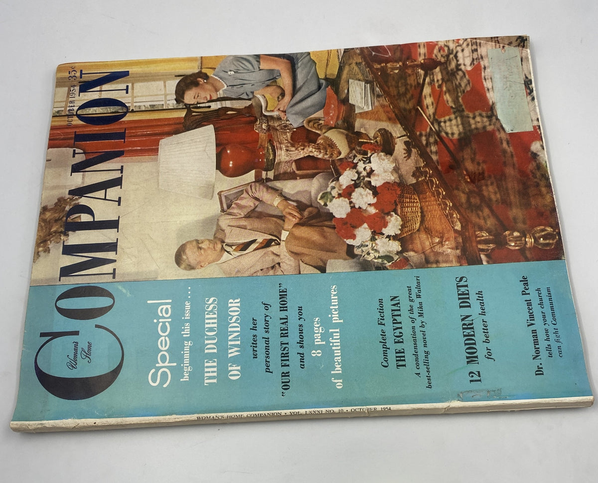 Another view of the Woman’s Home Companion Magazine October 1954 cover highlighting The Duchess of Windsor, with content on modern diets, beautiful pictures, and fascinating articles.