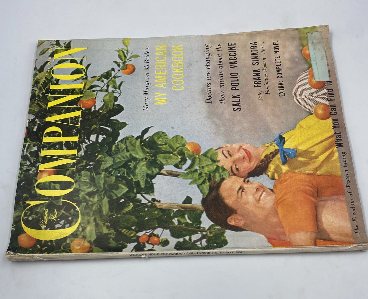 Woman's Home Companion Magazine May 1956 cover featuring 'My American Cookbook' and articles about the Salk Polio Vaccine and Frank Sinatra, showcasing a vibrant design with women amidst orange trees.