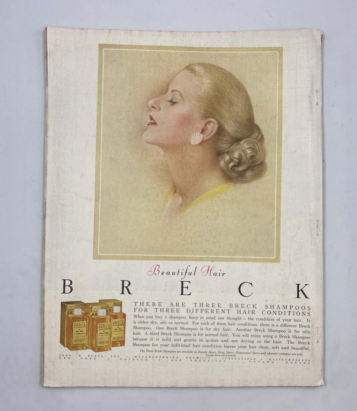 Advertisement from Woman's Home Companion Magazine May 1956 for Breck shampoos, featuring a stylish woman with elegant hair, emphasizing beauty hair care solutions.