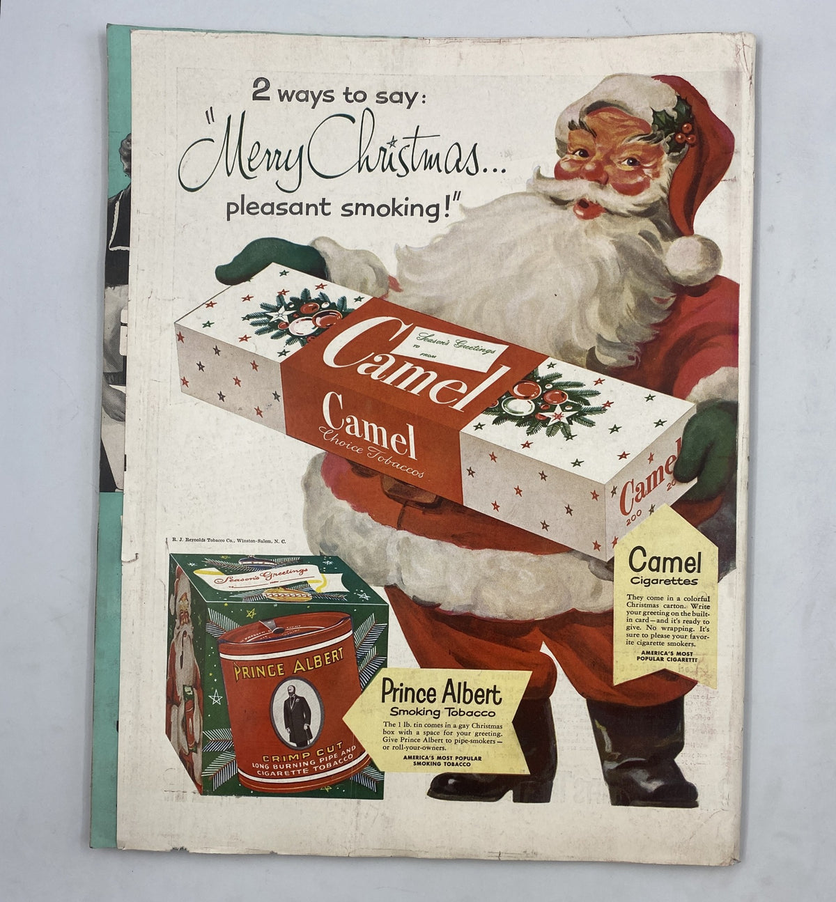 Cover of Woman’s Home Companion Magazine December 1951 featuring a festive Santa Claus promoting Camel and Prince Albert cigarettes. The design has vintage elements and captures the holiday spirit with an advertisement for smoking products.