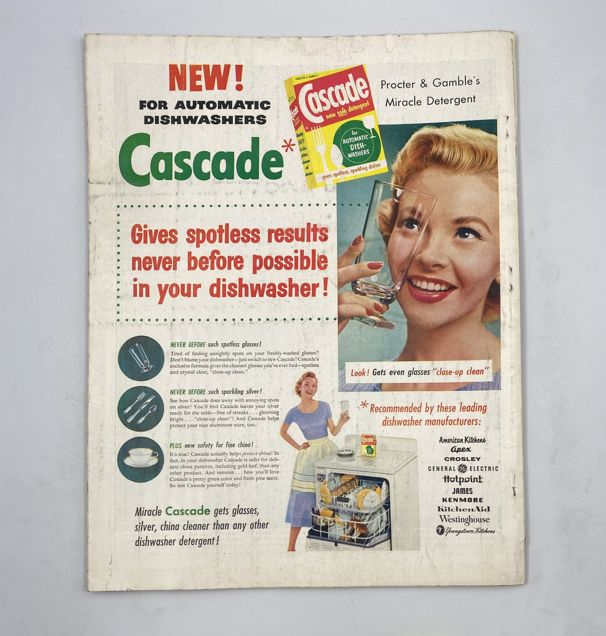 Advertisement for Cascade dishwasher detergent in Woman’s Home Companion Magazine November 1955, promoting spotless results for dishwashers with a vintage design.