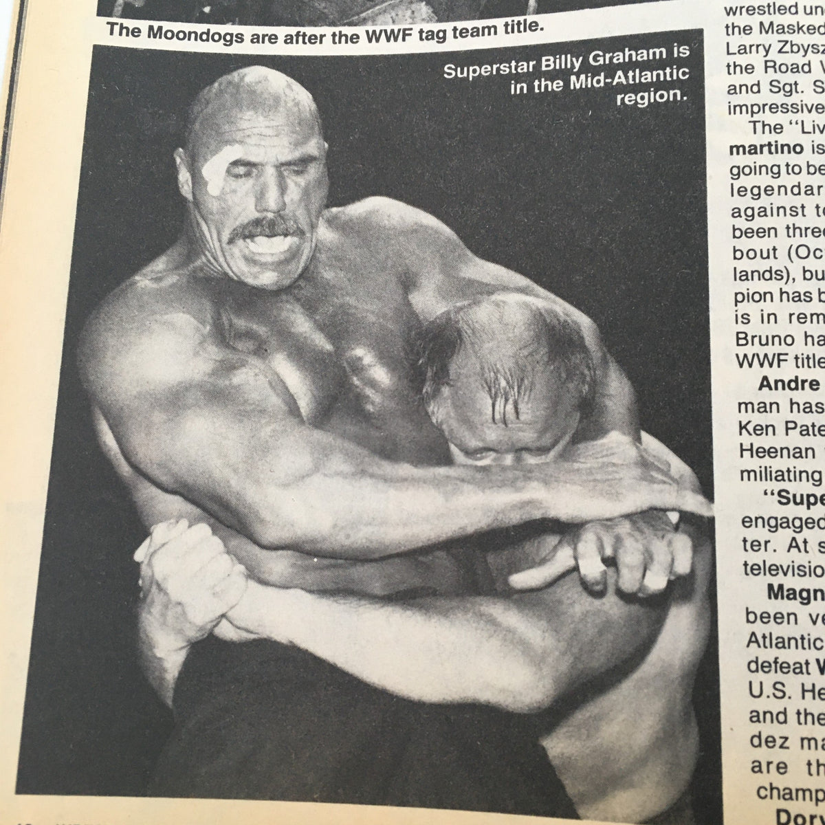 Wrestling Scene Magazine #22 May 1985 features a photograph of wrestler Billy Graham in an intense grappling hold during a WWF match, showcasing the action and drama of professional wrestling.