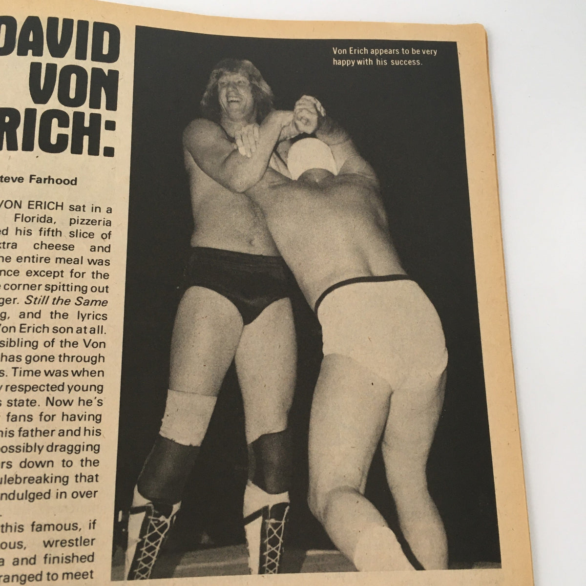 Profile of David Von Erich in a wrestling match, smiling while engaged with an opponent, reflecting the excitement of wrestling culture. Sports Review Wrestling Magazine September 1982 David Von Erich, Nick Bockwinkel.