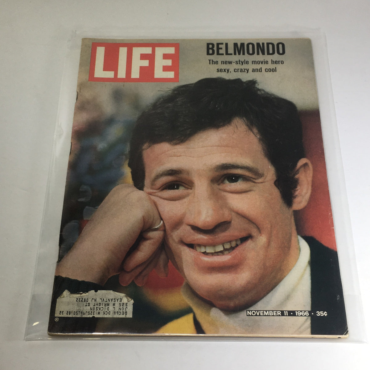 Cover of VTG Life Magazine from November 11, 1966 featuring Jean-Paul Belmondo as the new-style movie hero, emphasizing his cool, sexy, and carefree persona.