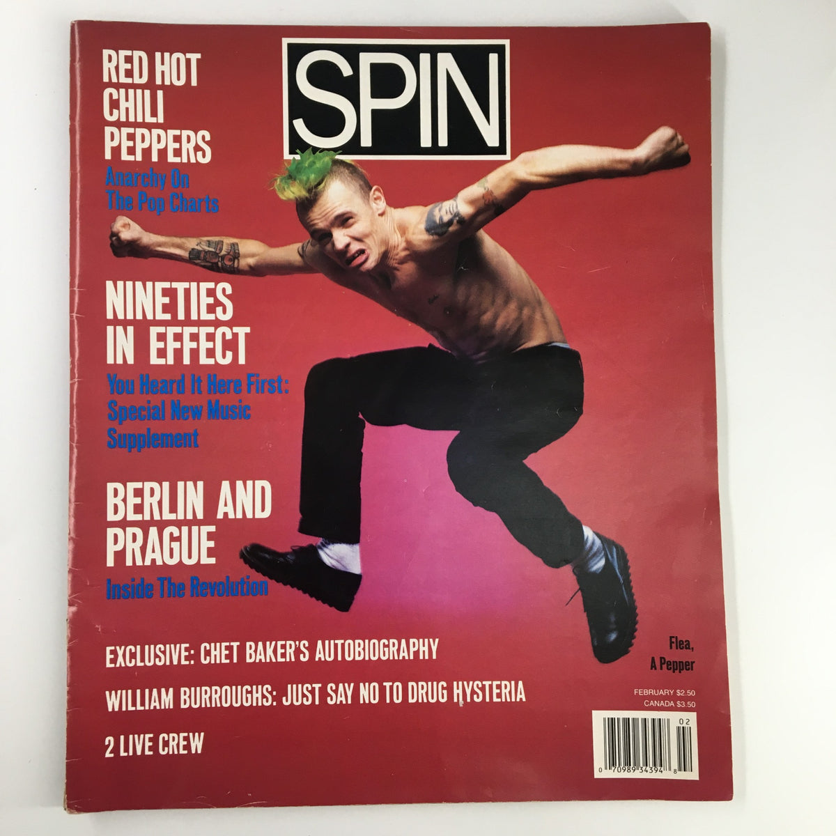 Spin Magazine February 1990 issue featuring Flea from Red Hot Chili Peppers on the cover, highlighting music culture of the early '90s.