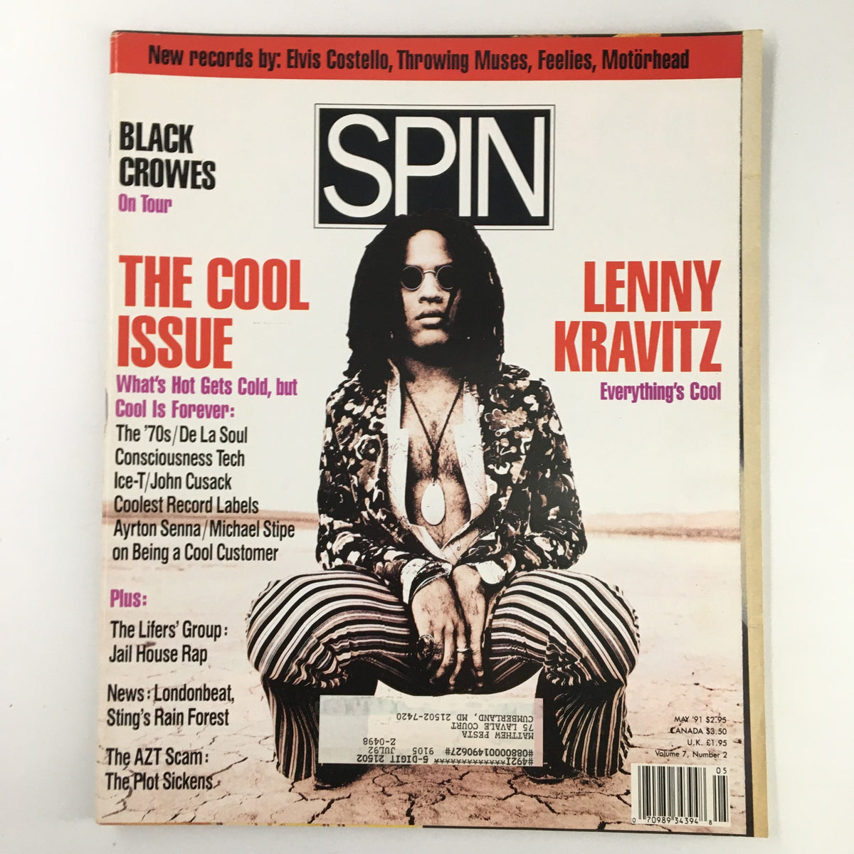 Spin Magazine May 1991 Cover featuring Lenny Kravitz and the Black Crowes. The cover emphasizes 'The Cool Issue' with striking visuals and notable articles about music culture.