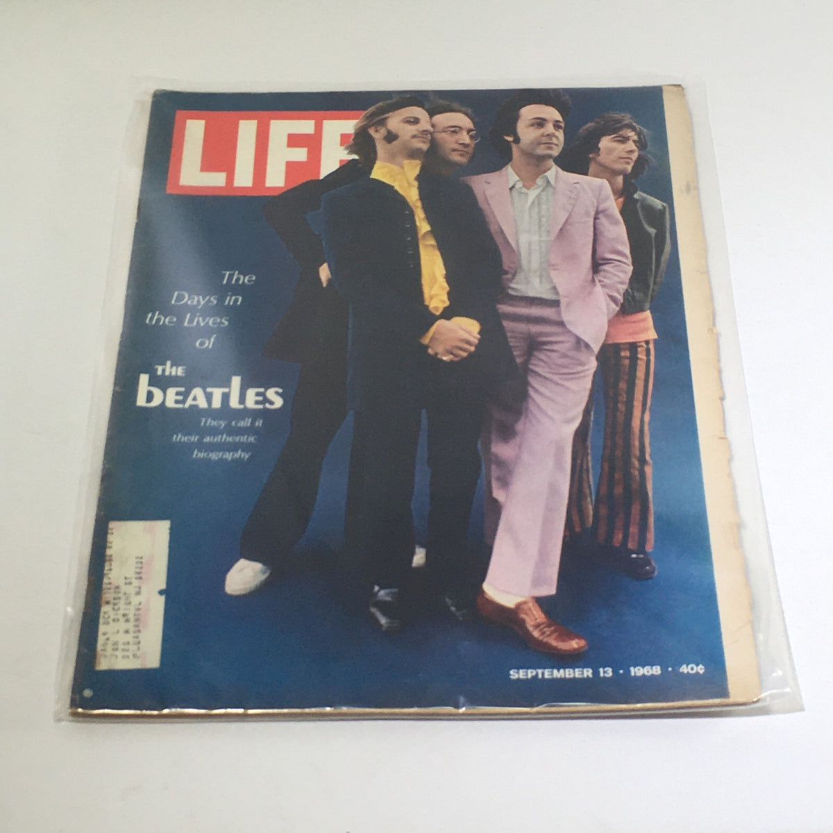 Vintage Life Magazine featuring The Beatles on the cover, titled 'VTG Life Magazine: September 13 1968 - The Days In The Lives of THE BEATLES'. This collectible magazine showcases The Beatles dressed in iconic 1960s fashion.