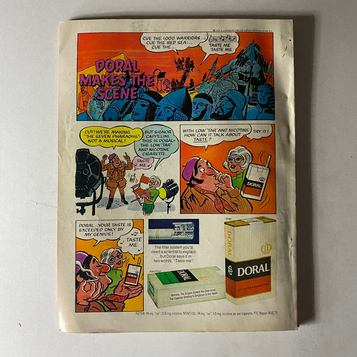 Comic advertisement for Doral cigarettes featuring colorful illustrations and humorous dialogue, from Woman's Day Magazine December 1971.