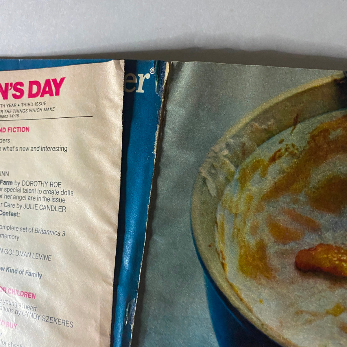 Cover of Woman's Day Magazine December 1975 featuring the magazine title and an image of a pot, highlighting festive cooking and crafting ideas.