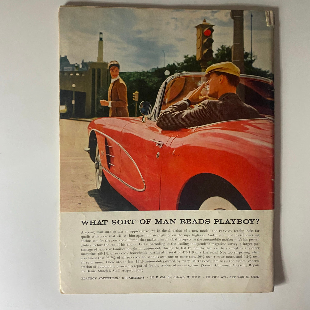 Back cover of Playboy Magazine April 1959, displaying an elegant image of a woman beside a classic red Corvette, with an advertisement titled 'What Sort of Man Reads Playboy?' for vintage marketing appeal.