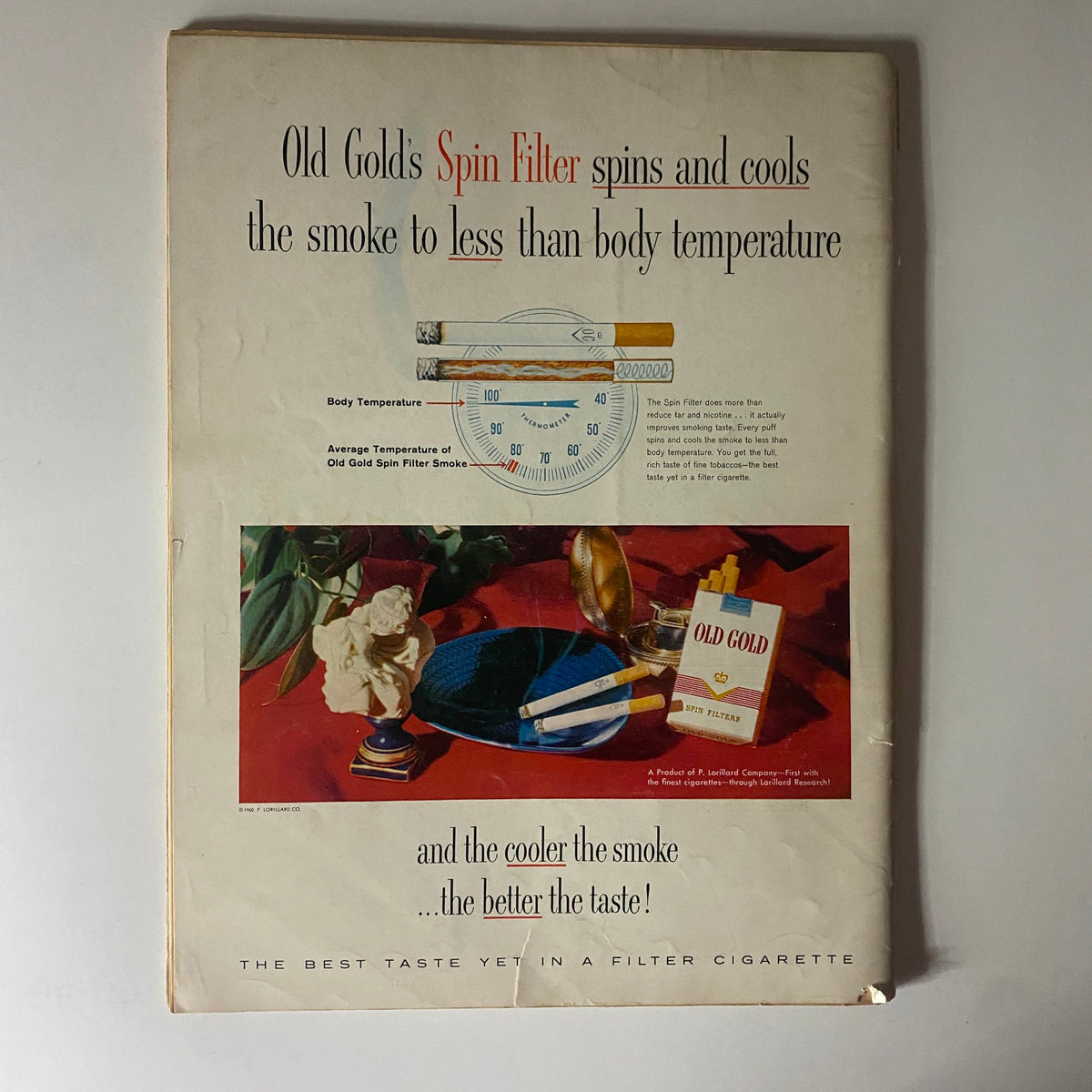 Back cover of Playboy Magazine February 1960 showcasing an advertisement for Old Gold Spin Filter cigarettes, emphasizing the cool smoke experience.