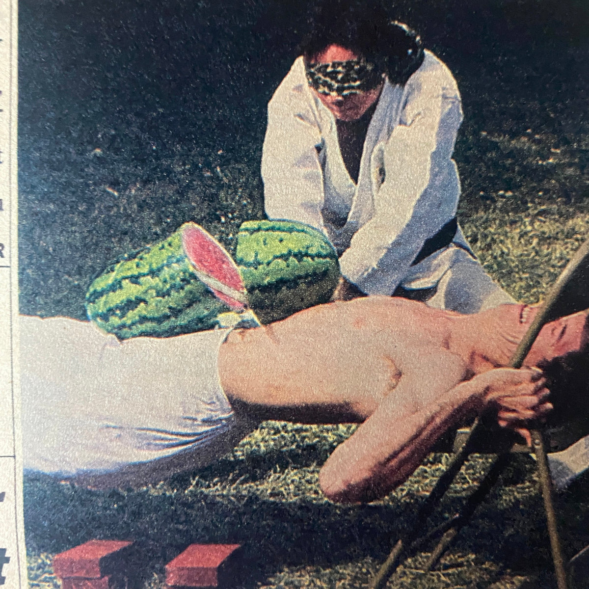National Enquirer February 14 1984 image of Y.K. Kim executing a precise watermelon slice as part of his martial arts showcase.