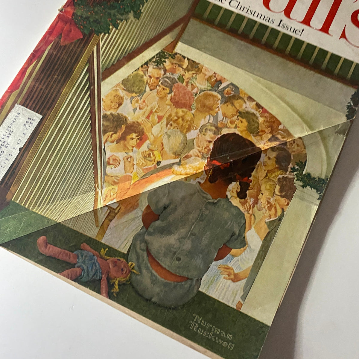 Close-up view of the cover of McCall's Magazine December 1964, highlighting Norman Rockwell's iconic holiday illustration that captures the warmth of the season.