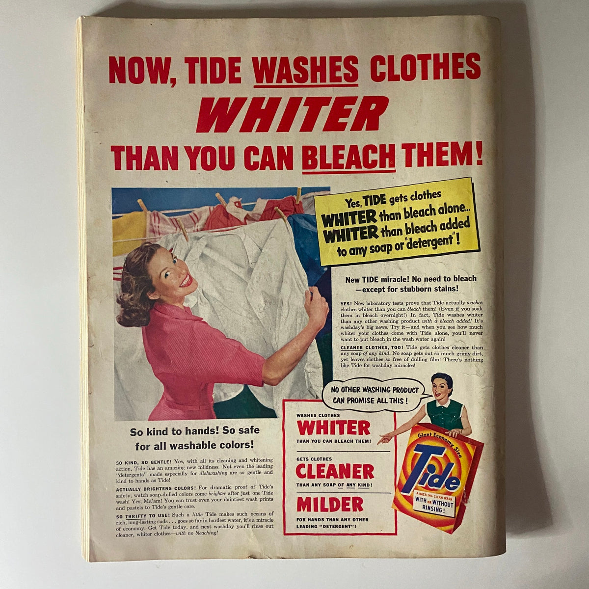 Ad for Tide laundry detergent in the October 1952 Ladies' Home Journal, emphasizing its ability to wash clothes whiter than bleach.