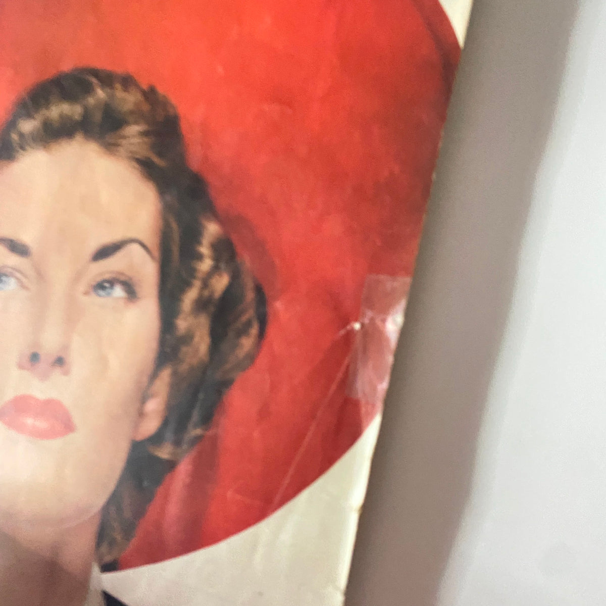 Close-up of the cover of Ladies' Home Journal Magazine November 1950, highlighting the vintage design and the woman's expression.