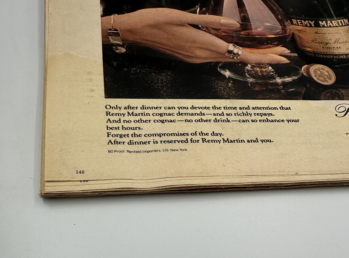 The New York Times Magazine September 25, 1977 advertisement for Remy Martin featuring a hand holding a drink, promoting the brand as an after-dinner choice.