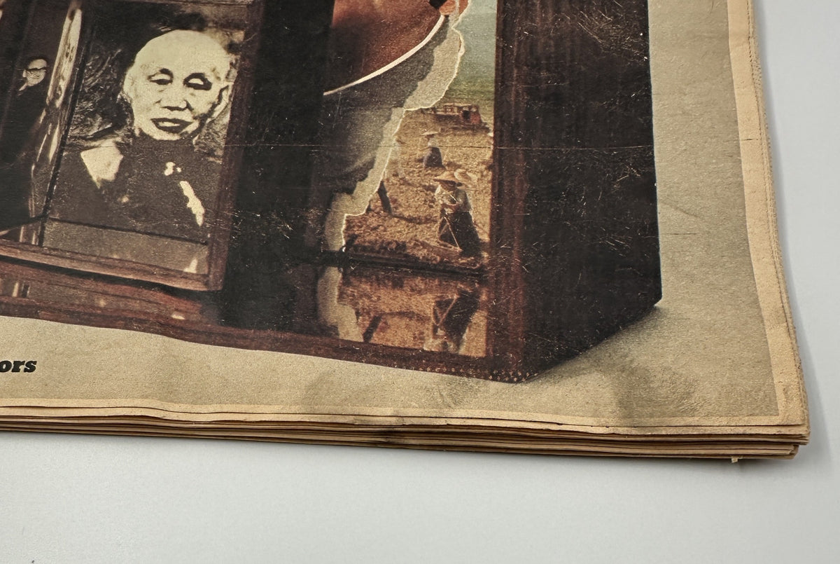Close-up view of the edge of The New York Times Magazine from April 6, 1975, showcasing typical wear, including creases and frayed pages, indicative of vintage publication condition.