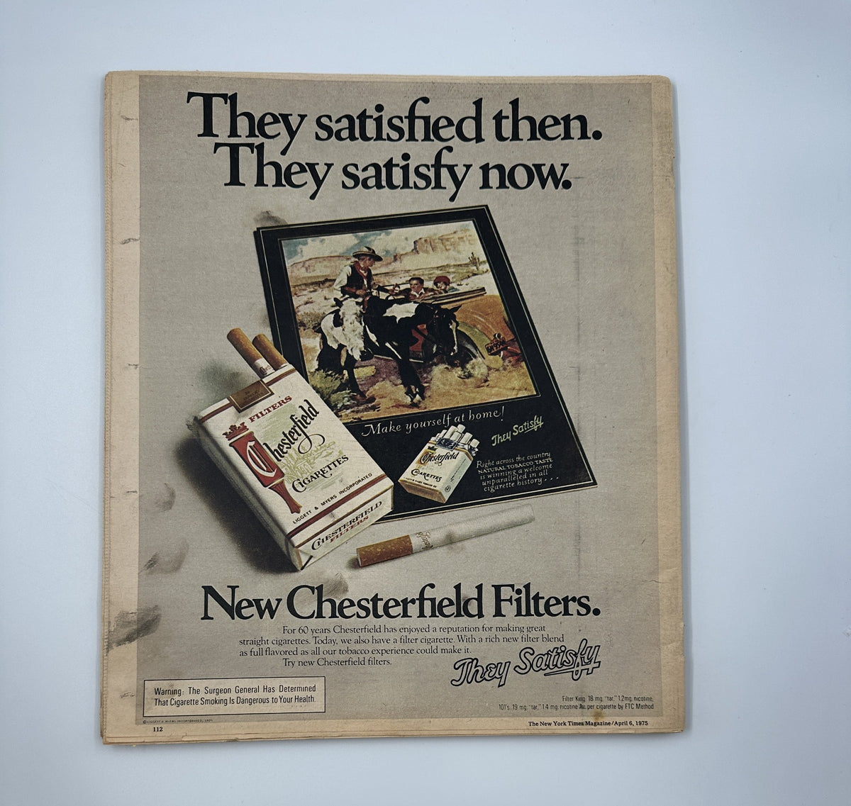 An advertisement from The New York Times Magazine, titled 'They satisfied then. They satisfy now.' featuring Chesterfield Filters cigarettes with an illustration of a cowboy and the caption 'Make yourself at home!' This image is part of the April 6, 1975 issue, which covers Mao China and U.S. policy.