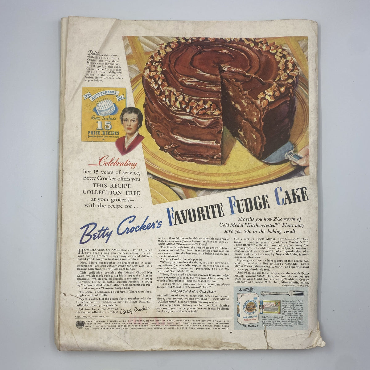 Cover of Woman's Home Companion Magazine from November 1936 featuring a celebration of Betty Crocker's Favorite Fudge Cake recipe, showcasing a beautifully sliced chocolate cake with nuts and an advertisement for the recipe collection.