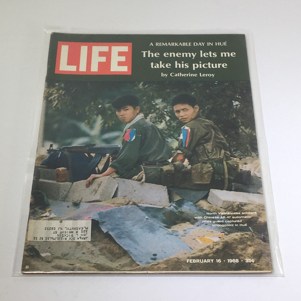 Vintage Life Magazine Cover featuring North Vietnamese Soldiers with Chinese AK-47s, February 16, 1968 edition, highlighting wartime imagery and historical significance.