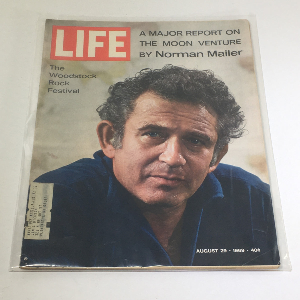VTG Life Magazine: August 29 1969 - The Woodstock Rock Festival featuring Norman Mailer, showcasing a vintage cover with a close-up image of a man, capturing the essence of the Woodstock era and its cultural significance.
