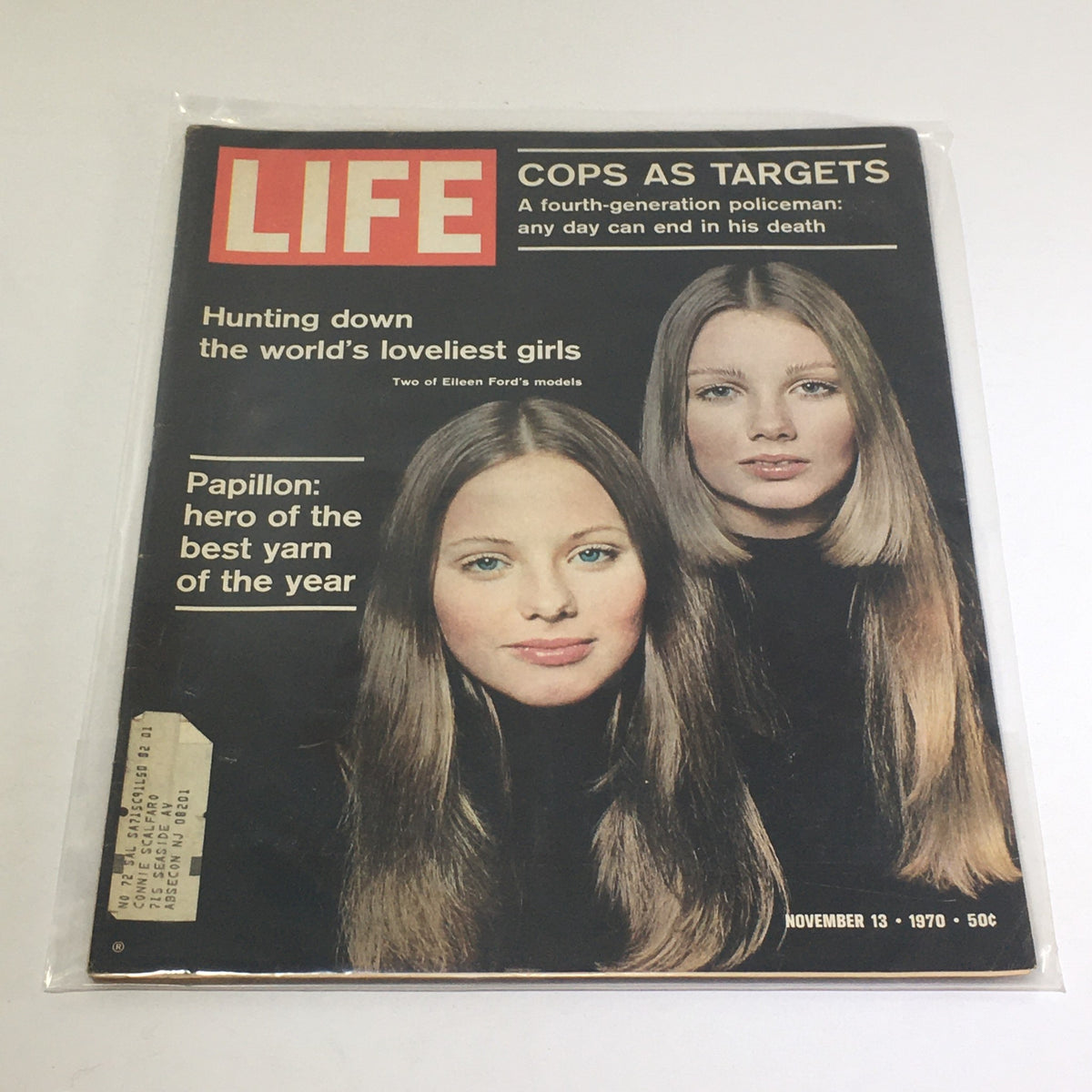 Vintage Life Magazine Cover featuring November 13, 1970 issue titled 'Cops at Targets' with models showcasing beauty, highlighted by the tagline 'Hunting down the world's loveliest girls'.