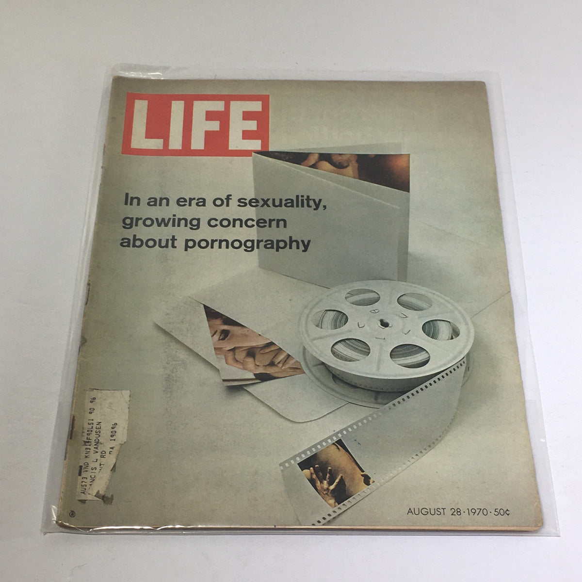 Cover of the vintage Life Magazine from August 28, 1970, titled 'In the Era of Sexuality, Growing Concern About Pornography', featuring a film reel and photographs that reflect cultural discussions of sexuality.