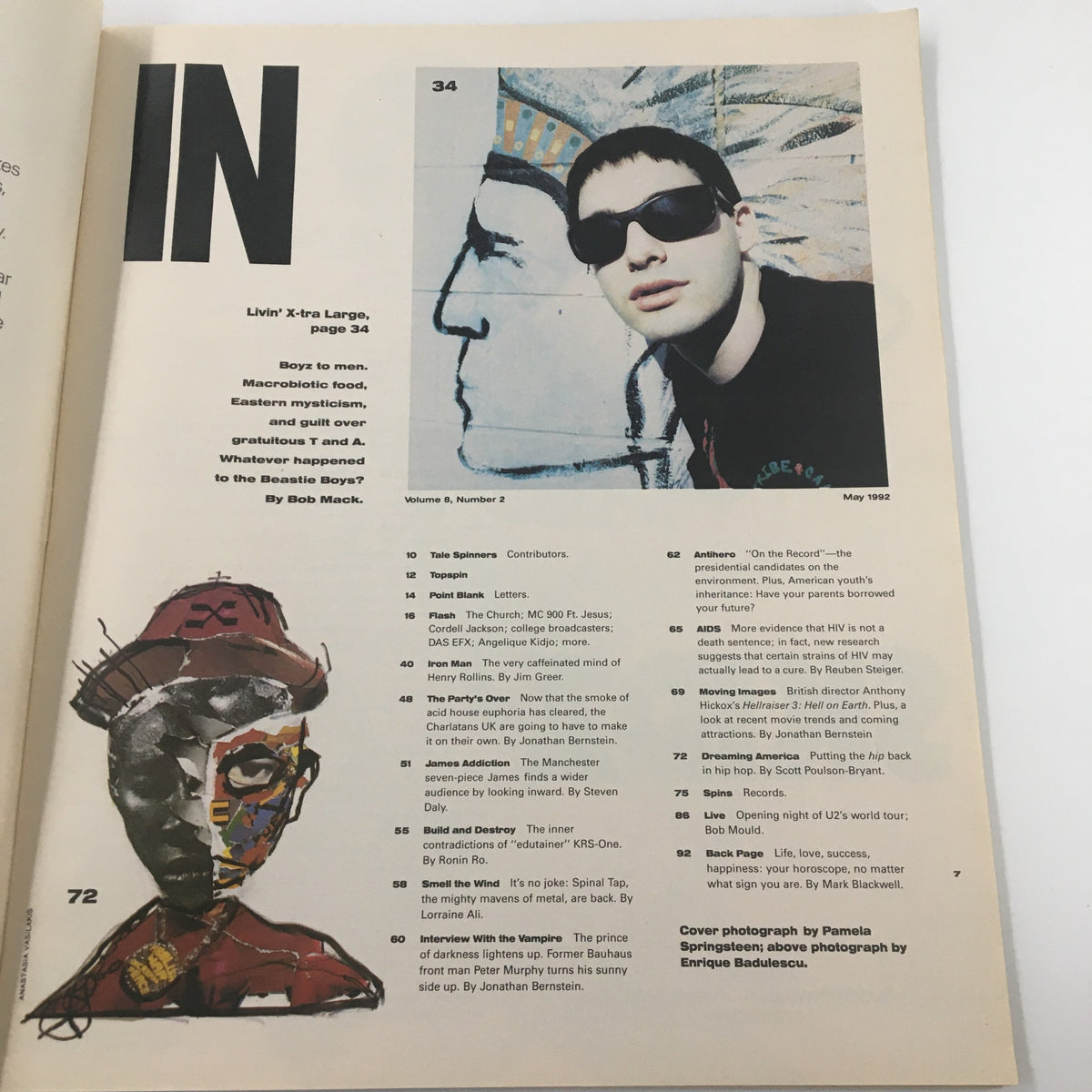 Inside page of Spin Magazine from May 1992 featuring the title 'IN' with a focus on the Beastie Boys. Includes a photo of a young male artist wearing sunglasses that stands against a vibrant graffiti background. The magazine highlights articles related to music, culture, and features significant artists of the '90s like U2 and Peter Murphy.