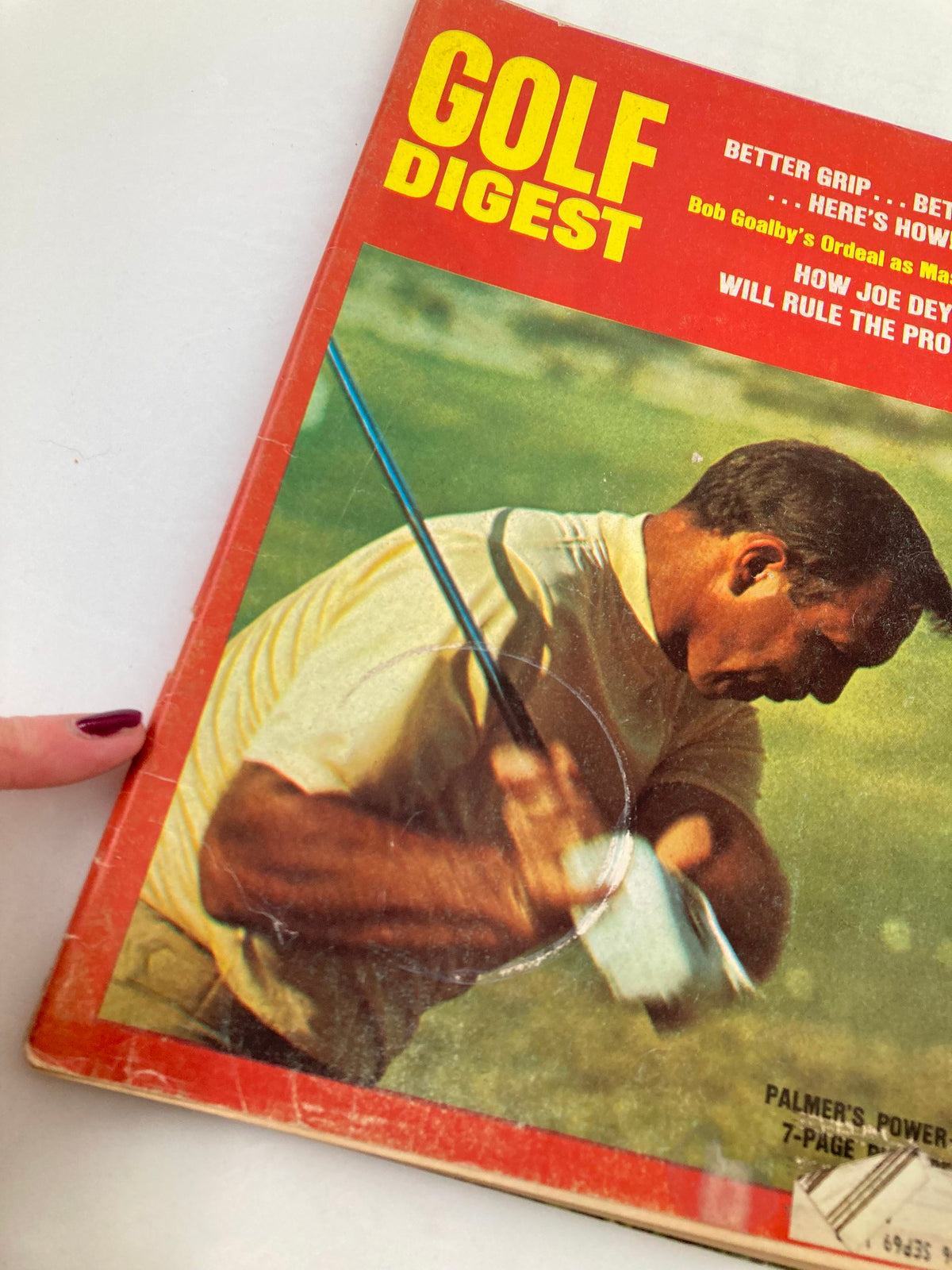 Close-up of the VTG Golf Digest Magazine April 1969 cover showcasing a golfer in action, emphasizing the article about Joe Dey's role in professional golf.