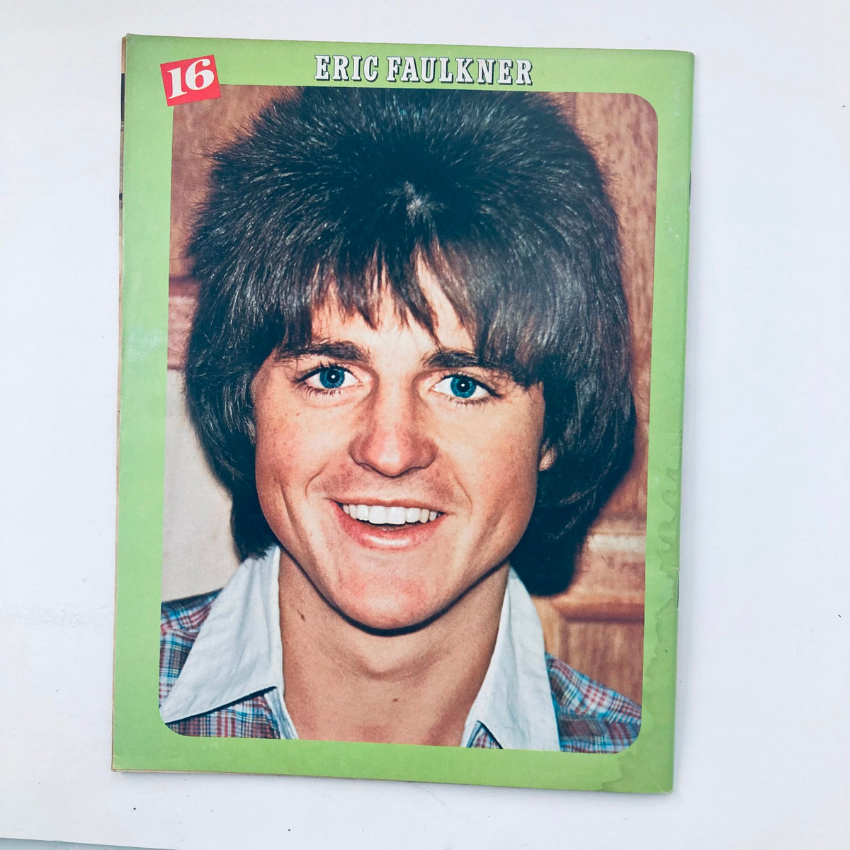 Cover of 16 Magazine October 1976 featuring Eric Faulkner with prominent features and a heartfelt smile, reflecting the essence of 70s celebrity culture.