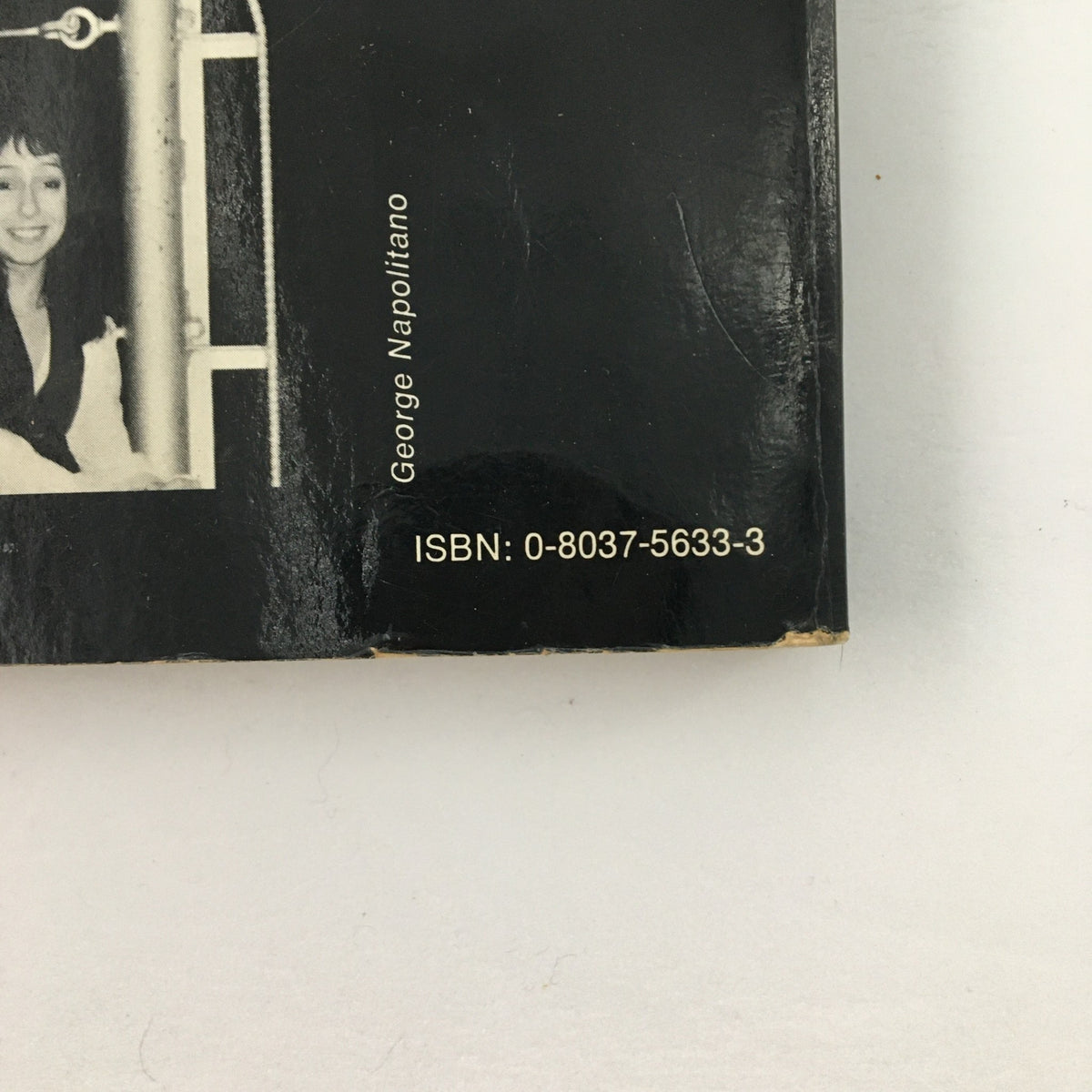 Close-up of the spine of the Roberta Morgan Main Event World of Professional Wrestling 1979 magazine showing ISBN and a photograph credit.