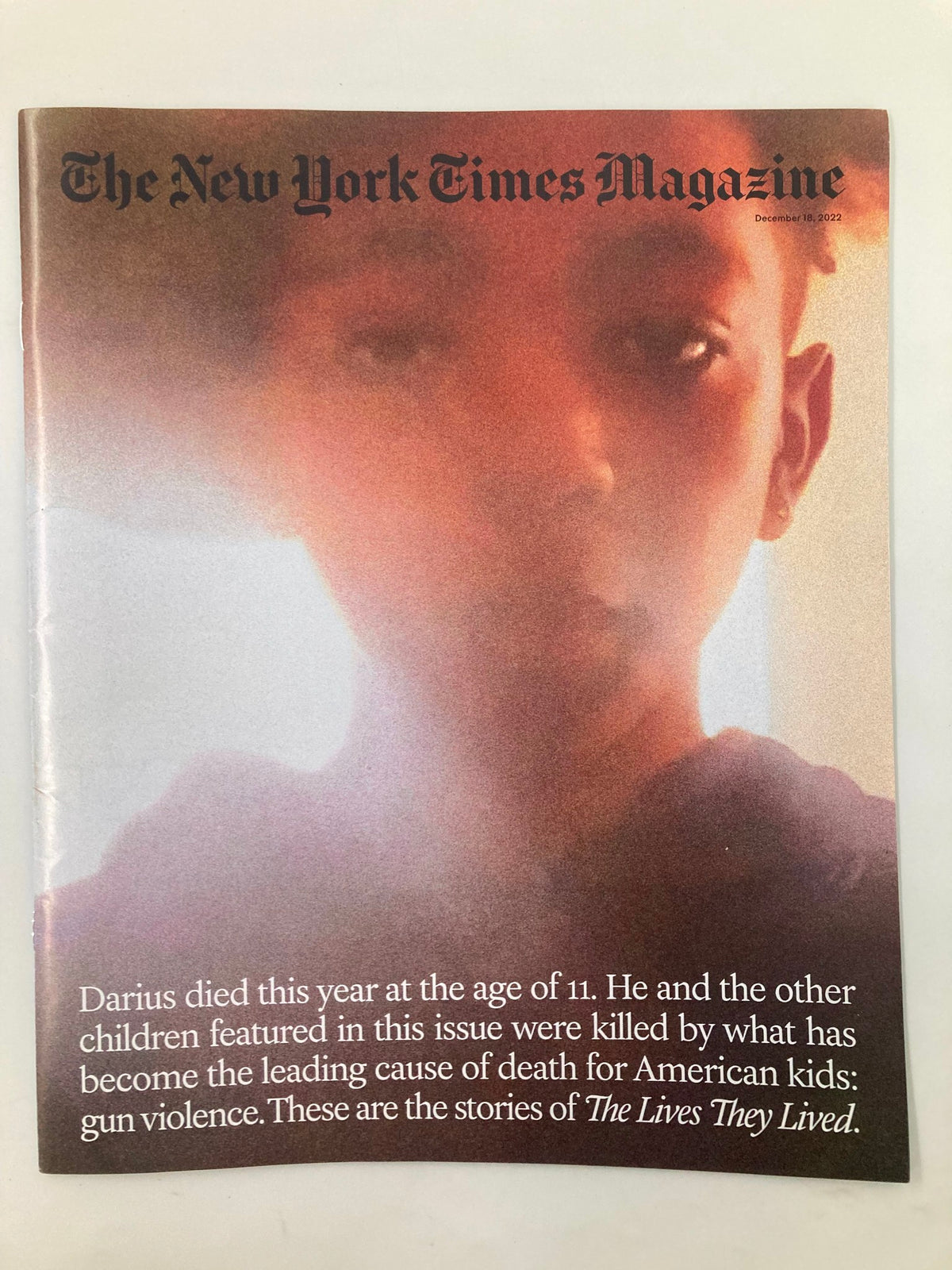Cover of The New York Times Magazine December 18, 2022, featuring the title 'Darius at the Age of 11,' highlighting the story of a child impacted by gun violence. This vintage magazine captures important cultural narratives and provides insights into societal issues.