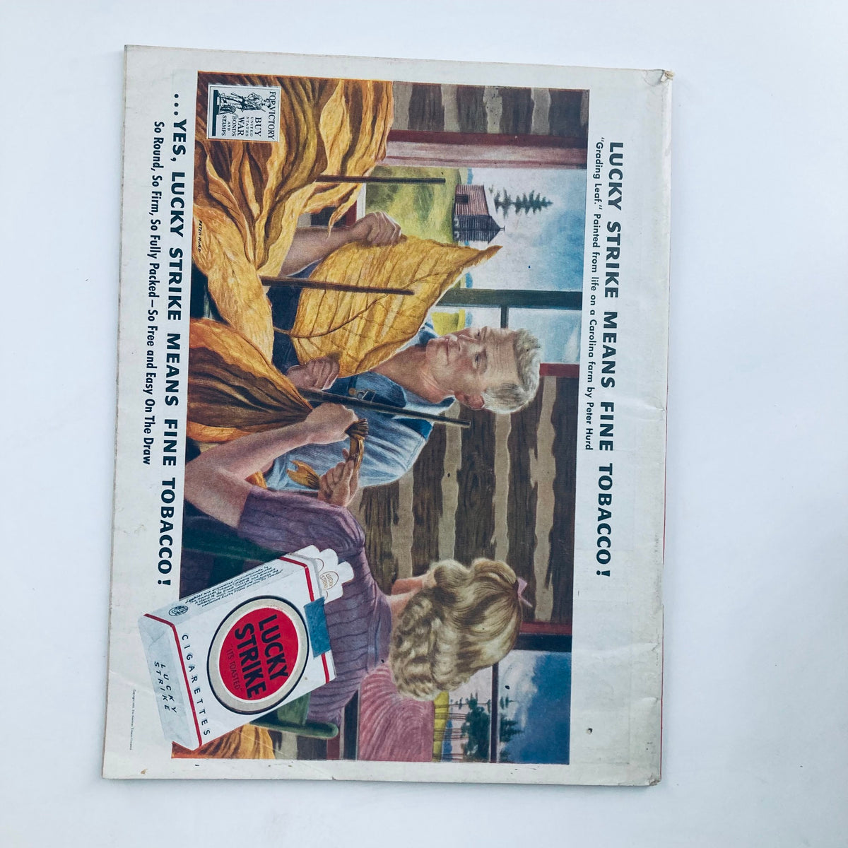 Back cover of Vintage Time Magazine from November 22, 1943, featuring a colorful advertisement for Lucky Strike cigarettes.
