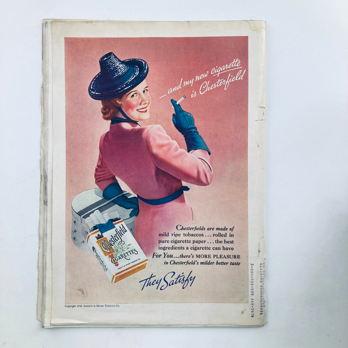 Advertisement page from a vintage Time Magazine for Chesterfield cigarettes, showcasing a woman in a stylish outfit, from May 2, 1938.