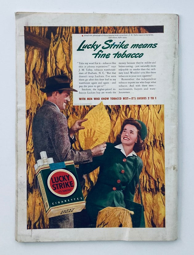 Back cover of a vintage magazine advertisement for Lucky Strike cigarettes, showcasing a man and woman discussing tobacco amongst leaves, with the tagline promoting the quality of Lucky Strike.