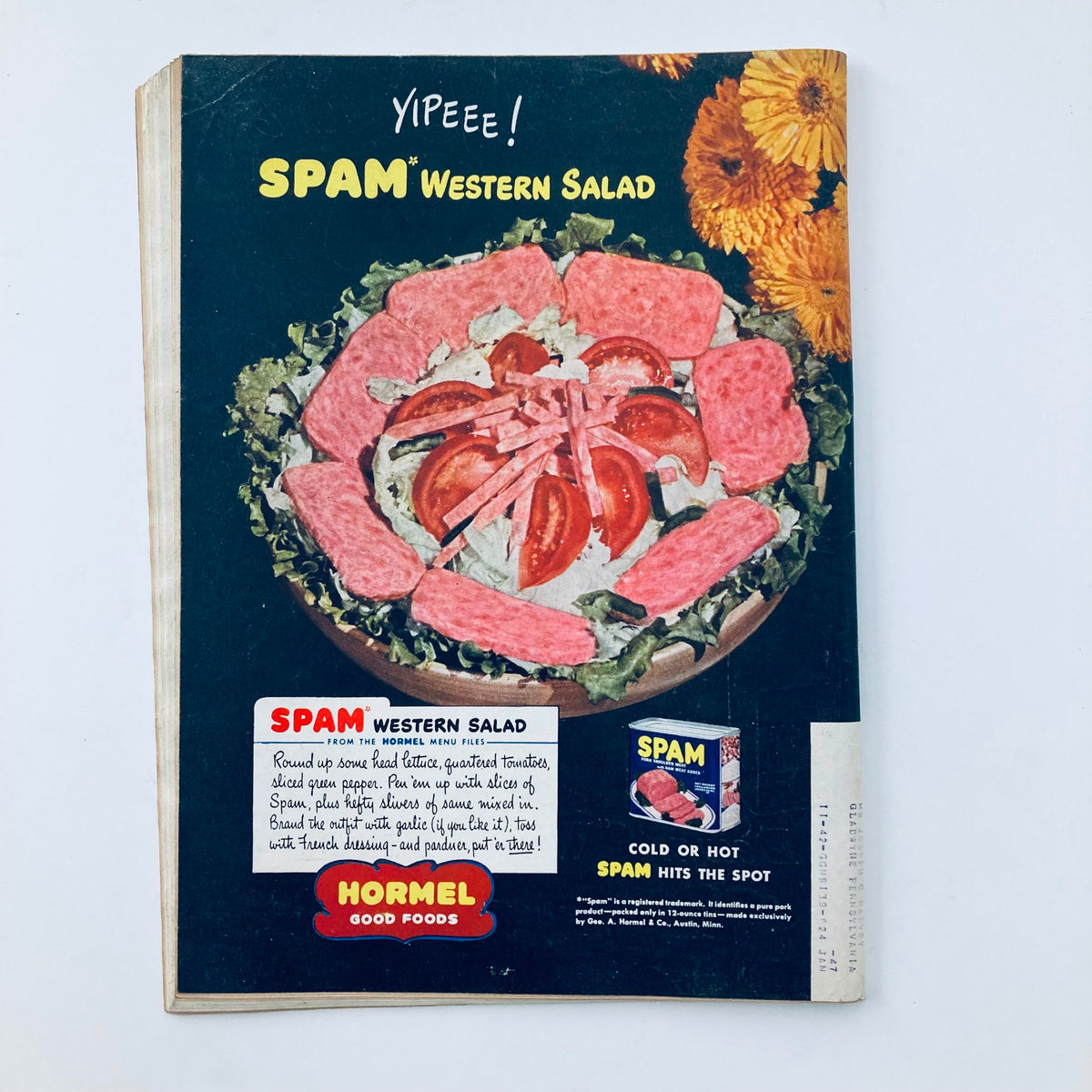 Vintage advertisement for SPAM Western Salad from Hormel, featuring a colorful display of salad with SPAM slices and tomatoes.