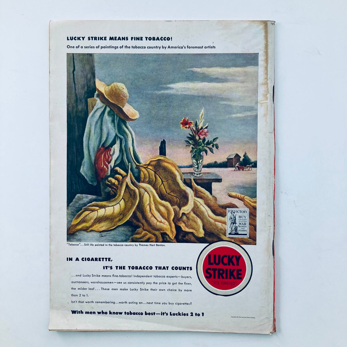 Vintage advertisement from Time Magazine October 26, 1942, featuring a painting related to tobacco, showcasing a woman with a straw hat and a still life with flowers.