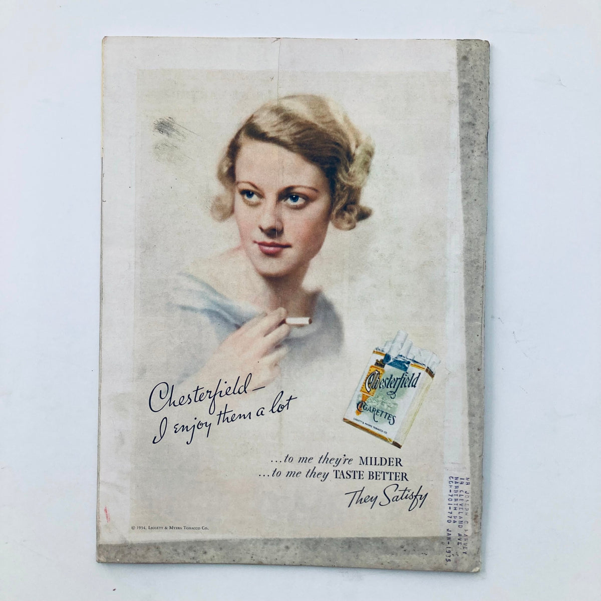 Back cover of VTG Time Magazine January 22 1934 featuring a vintage advertisement for Chesterfield Cigarettes with a woman holding a cigarette.