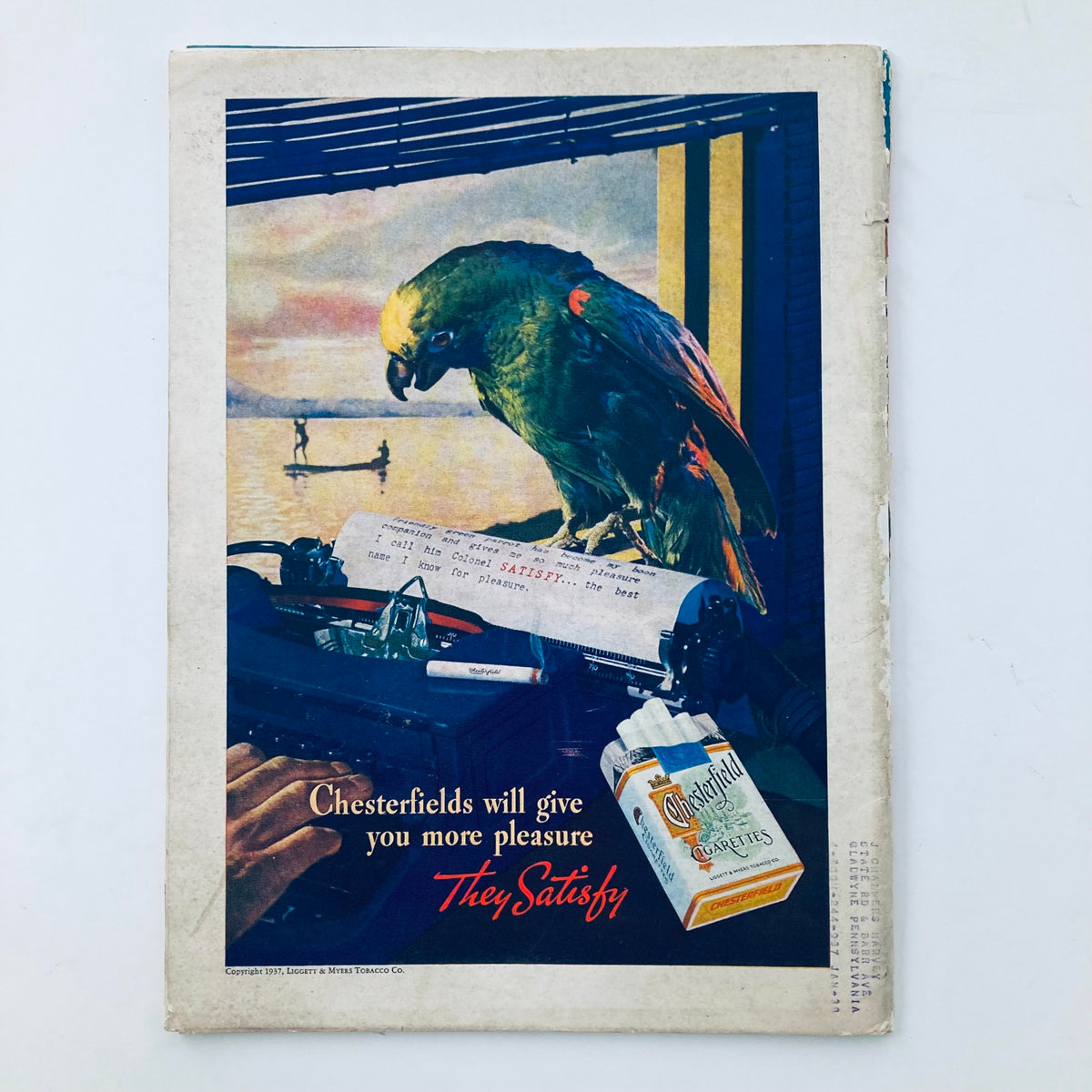 Vintage Time Magazine September 20 1937 Vol 30 No. 12 featuring an advertisement for Chesterfield cigarettes showcasing a parrot overlooking a typewriter, emphasizing nostalgia and historical advertising techniques.