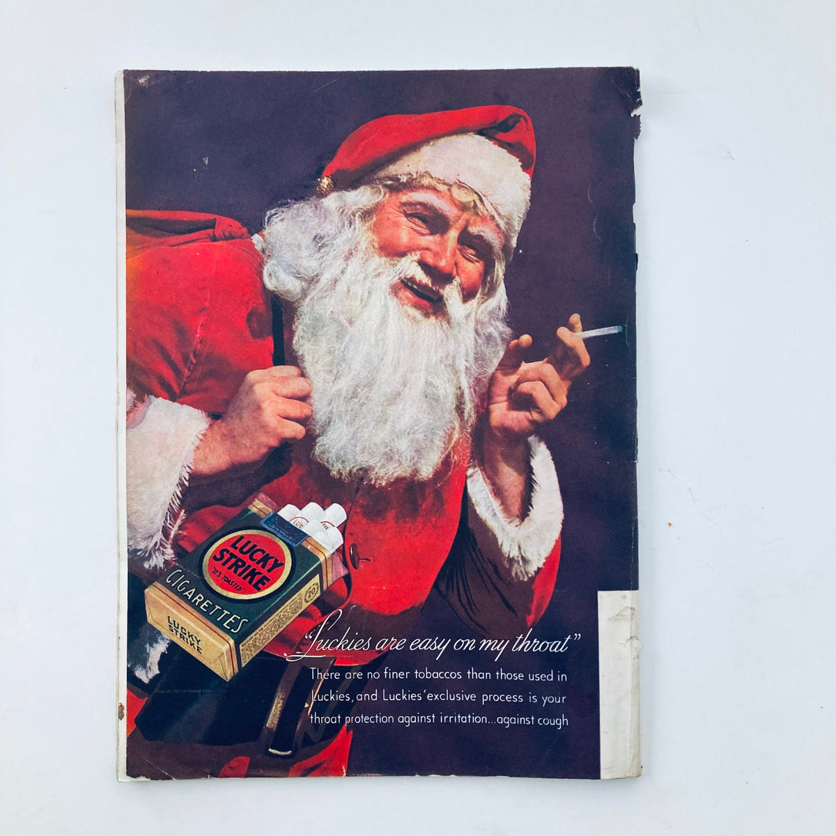 Cover of VTG Time Magazine December 2 1935, showcasing Santa Claus holding a pack of Lucky Strike cigarettes, a vintage advertisement.