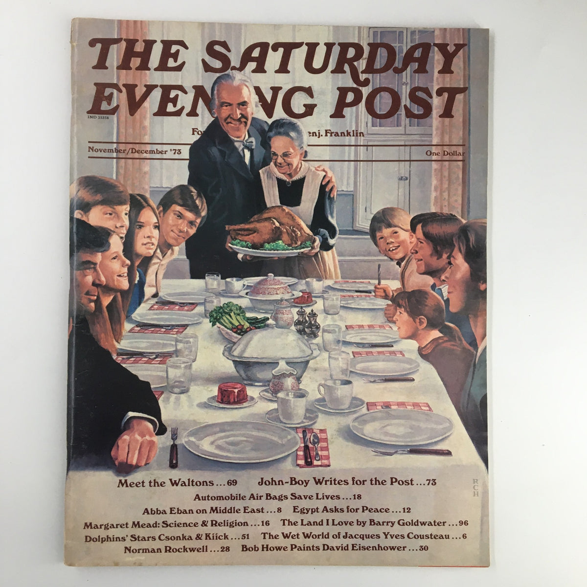 The Saturday Evening Post November 1973 cover featuring a warm Thanksgiving scene with a family gathered around the dinner table, showcasing a roasted turkey and joyful expressions, encapsulating nostalgia and celebration.