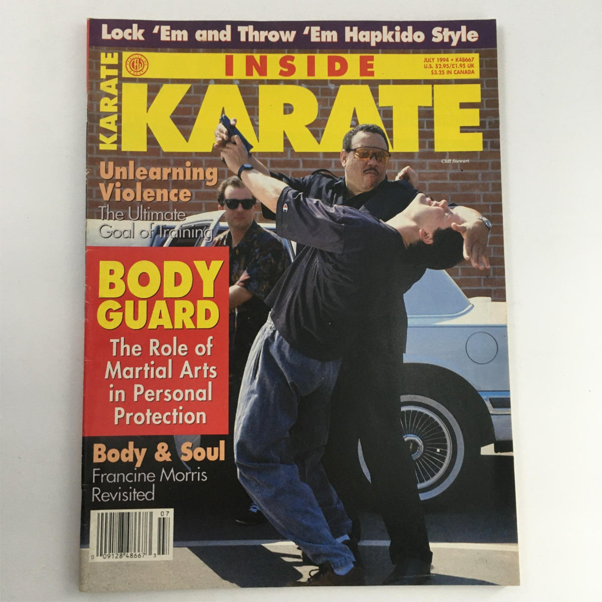 Cover of Inside Karate Magazine July 1994 featuring articles on unlearning violence, bodyguard techniques, and personal protection in martial arts, with a striking visual representing martial arts practices.