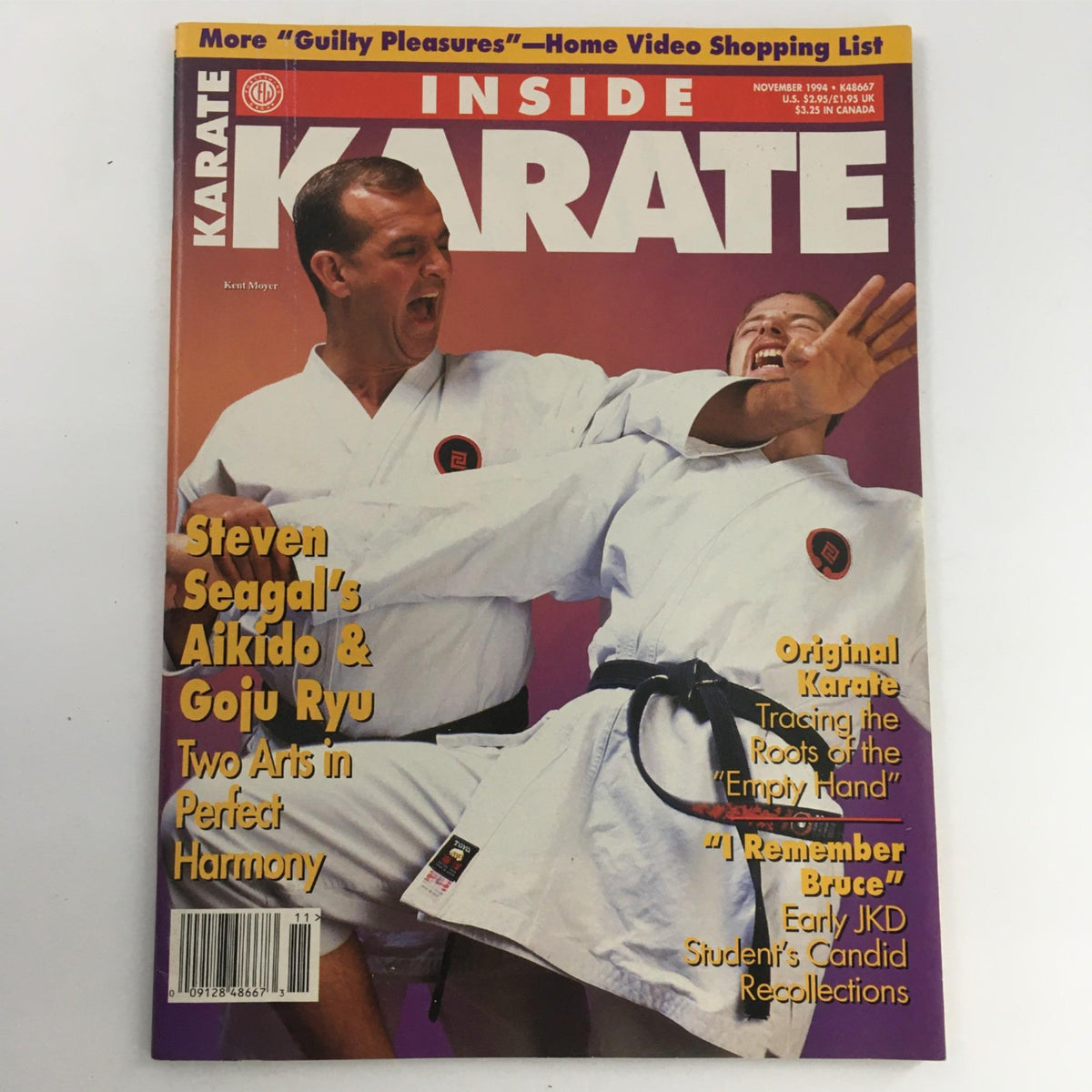 Cover of Inside Karate Magazine November 1994 featuring Kent Moyer and Steven Seagal. The issue highlights 'Steven Seagal’s Aikido & Goju Ryu' with bold text and colorful images, capturing martial arts culture.