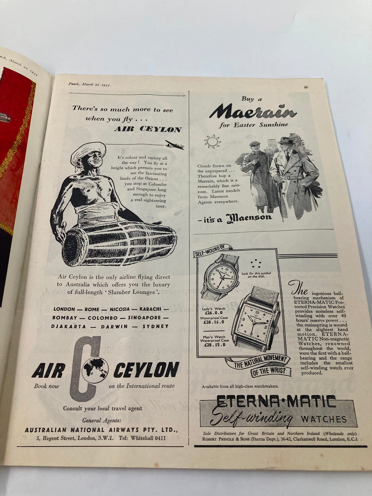 Interior page of the VTG Punch Magazine from March 26, 1952, displaying vintage advertisements for Air Ceylon and Eterna-Matic watches.
