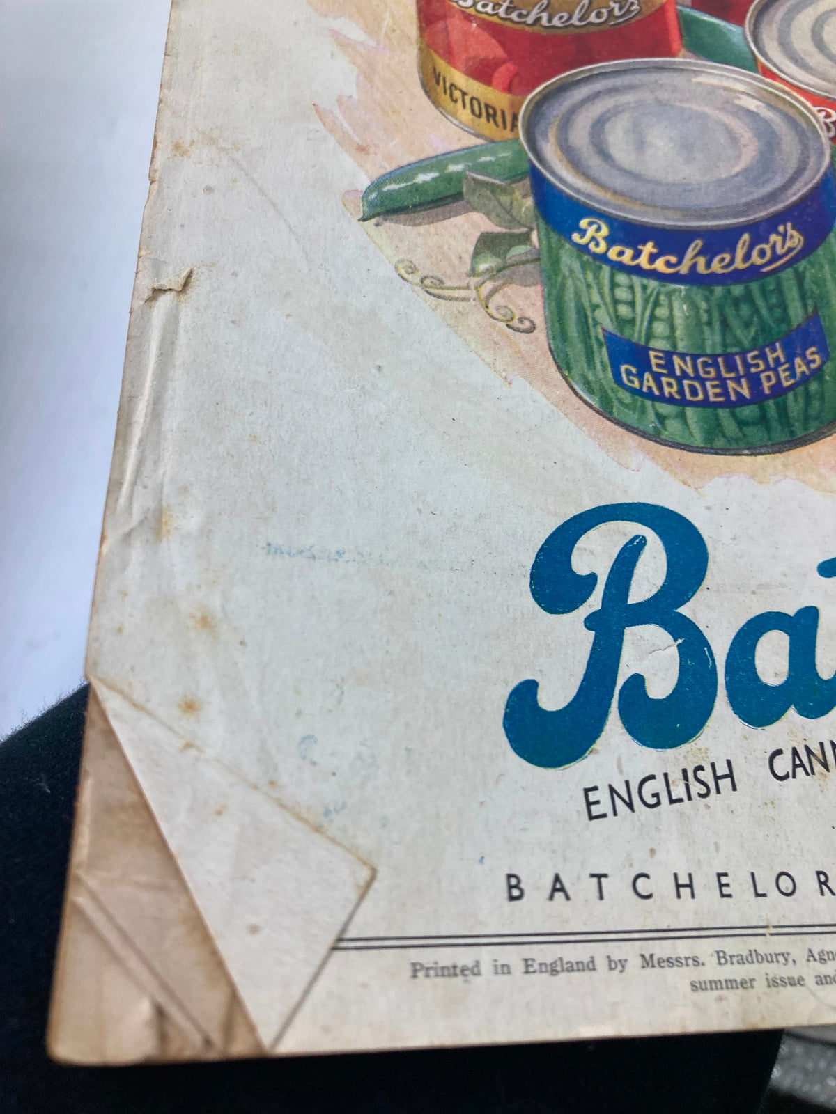 Close-up view of the vintage Punch Magazine from May 14, 1945, showcasing the worn cover with visible creases and marks, highlighting its historical significance and summer-themed cartoons from the World War II era.